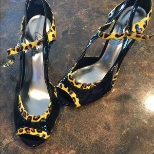 Black and yellow animal print heels
